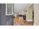 Inviting entryway with hardwood floors leading into a spacious and bright living area at 4524 Ramsey Ford Rd., Tabor City, NC 28463