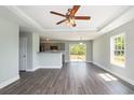 Open-concept living space with a kitchen and sliding glass door access to the yard at 469 Overcrest St., Myrtle Beach, SC 29579
