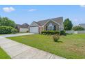 Well-maintained home with a manicured lawn, two-car garage and brick facade elements at 5107 Capulet Circle, Myrtle Beach, SC 29588