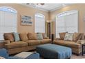Comfortable living area featuring plush sofas, arched windows, and neutral decor providing a relaxing atmosphere at 6001-T36 South Kings Hwy., Myrtle Beach, SC 29575