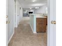 Open-concept living space showcasing a seamless transition between the kitchen, dining, and living areas, perfect for modern living at 712 Dogwood Dr. S # 101, Surfside Beach, SC 29575