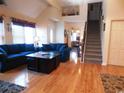 Spacious living room with hardwood floors, comfortable seating, and plenty of natural light at 916 Charles St., North Myrtle Beach, SC 29582