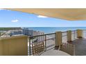 Balcony overlooking the ocean with seating at 9994 Beach Club Dr. # 2403, Myrtle Beach, SC 29572
