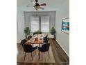 Dining room with a ceiling fan, table for six, and natural light at 109 Old Town Way # 4, Myrtle Beach, SC 29588