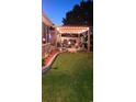 Backyard patio with string lights and outdoor furniture creating an inviting and cozy atmosphere at 1717 Perdiz Covey Ct., Myrtle Beach, SC 29588