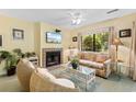 Cozy living room with a fireplace and comfortable seating area at 234 Westleton Dr. # 21-C, Myrtle Beach, SC 29572