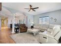 Inviting living room with open archways, and stylish furnishings at 311 2Nd Ave. N # 210, North Myrtle Beach, SC 29582