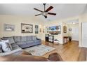 Comfortable living room featuring hardwood floors, neutral walls, and recessed lighting, with modern decor and furnishings at 4008 Scarlet Oak Ct., Myrtle Beach, SC 29579