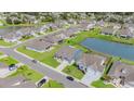 Beautiful aerial view of homes in neighborhood featuring lakefront properties and verdant landscaping at 567 Hickman St., Myrtle Beach, SC 29575