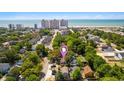 Aerial view showing home's proximity to Myrtle Beach coastline and cityscape at 607 A 28Th Ave. S, North Myrtle Beach, SC 29582