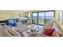 Bright living room with ocean views at 645 Retreat Beach Circle # A-2-C, Pawleys Island, SC 29585