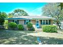 Inviting single-story brick home with neat landscaping and a welcoming front entrance at 703 S 21St Ave. S, North Myrtle Beach, SC 29582