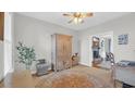 Cozy room with neutral walls, ceiling fan, and carpeted floor, decorated with vintage furniture at 813 Bear Lake Dr., Longs, SC 29568
