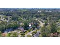 Aerial view of a home nestled in a lush, green neighborhood near the coastline at 88 Purple Martin Dr., Murrells Inlet, SC 29576