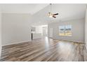 Spacious living room with hardwood floors, high ceilings, and plenty of natural light at 109 Old Chimney Ln, Conway, SC 29526