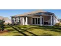 This home features a large backyard with a patio perfect for relaxing and entertaining at 1236 Barrington Way, Conway, SC 29526