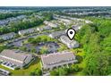 An aerial view of a townhome community, highlighting its prime location and amenities at 157 Olde Towne Way # 4, Myrtle Beach, SC 29588