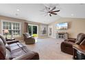 Spacious living room with plush seating, vaulted ceilings, and access to the backyard at 3926 Long Avenue Ext., Conway, SC 29527