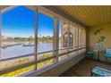 Screened-in porch featuring a tranquil view of the salt marsh at 501 Maison Dr. # F8, Myrtle Beach, SC 29572