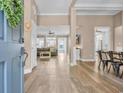 Bright and spacious foyer with hardwood floors seamlessly flowing into the living areas at 1203 Crooked Oak Dr., Pawleys Island, SC 29585