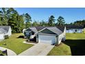 Charming single Gathering home with two-car garage, manicured lawn and attractive landscaping at 1220 Alcazar Ct., Conway, SC 29527