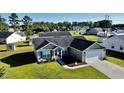 Charming single Gathering home with two-car garage, manicured lawn and attractive landscaping at 1220 Alcazar Ct., Conway, SC 29527