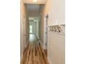 Inviting hallway with hardwood floors and coat rack, offering a welcoming entrance at 232 Palm Cove Circle, Myrtle Beach, SC 29588