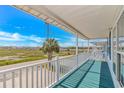 Inviting outdoor space with lovely views of the serene coastal landscape at 414 32Nd Ave. N, North Myrtle Beach, SC 29582