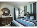 A beautifully decorated bedroom featuring a comfortable bed and stylish coastal decor at 532 Magnolia Terrace Dr, Myrtle Beach, SC 29579