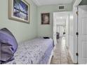 Comfortable bedroom showcases a twin bed with a coastal-themed decor and is bathed in soft, natural light at 5905 South Kings Hwy. # 135, Myrtle Beach, SC 29575
