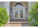 Inviting front entrance features rocking chairs, beautiful double doors, and a covered porch at 631 Edgecreek Dr., Myrtle Beach, SC 29579