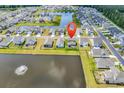 Aerial view of a beautiful home in a lakeside community with water features at 732 Mustang Ranch Dr., Myrtle Beach, SC 29588