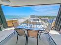 Inviting balcony with patio furniture and ocean views, perfect for relaxing and enjoying the scenery at 9650 Shore Dr. # 1203, Myrtle Beach, SC 29572