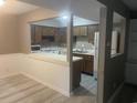 This remodeled kitchen features stainless steel appliances and a modern backsplash at 10301 N Kings Hwy. # 22-11, Myrtle Beach, SC 29572
