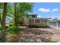Beautiful backyard showcasing the home's outdoor space with lush landscaping and a cozy patio area at 1314 Holly Dr., North Myrtle Beach, SC 29582
