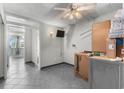 Utility room with washer dryer hookups, drop ceiling, and access to the Kitchen and Bedroom at 1600 S Ocean Blvd. # 254, Myrtle Beach, SC 29577