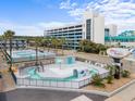 Gathering-friendly water park, with pools, slides, and ample lounge seating, all within a vibrant resort setting at 1600 S Ocean Blvd. # 254, Myrtle Beach, SC 29577