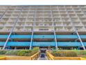 Stunning exterior shot of the condo building boasting multiple balconies for ocean views at 1709 S Ocean Blvd. # 403, North Myrtle Beach, SC 29582