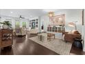 Spacious living room with built-in shelving and abundant natural light at 235 Welcome Dr., Myrtle Beach, SC 29579