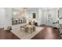 Inviting living room with accent rug and built-in shelving at 235 Welcome Dr., Myrtle Beach, SC 29579