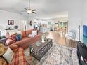 Inviting living room showcasing an open floor plan, vaulted ceilings, and stylish decor at 40 Little Peru Ct., Georgetown, SC 29440