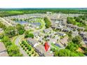 Beautiful aerial view showcasing the community's layout, landscaping, and surrounding green spaces at 448 Papyrus Circle # 448, Little River, SC 29566