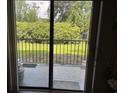 View from patio with mature manicured garden and greenery at 5001 Little River Rd. # E-117-119, Myrtle Beach, SC 29577