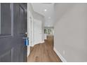 Welcoming entryway with wood-look floors and neutral paint, leading to living spaces at 5038 Belleglen Ct. # 202, Myrtle Beach, SC 29579