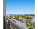 A serene view from the balcony of the ocean, beach, and parking at 504 N Ocean Blvd. N # 309, Myrtle Beach, SC 29577