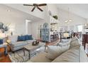 Bright and airy living room with high ceilings, hardwood floors, and stylish furnishings at 523 Stonemason Dr., Myrtle Beach, SC 29579
