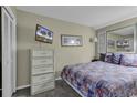 Cozy bedroom with bamboo dresser and nautical bedding at 5905 South Kings Hwy. # 433, Myrtle Beach, SC 29575