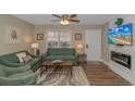 Comfortable living room boasts stylish furnishings, a flat-screen TV, and a welcoming ambiance at 6001-8026 South Kings Hwy., Myrtle Beach, SC 29575