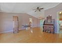 Spacious living area with hardwood floors, a ceiling fan, and classic design at 6544 Amberwood Ct., Myrtle Beach, SC 29588