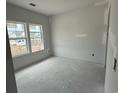 Spacious bedroom with natural light streaming through large windows at 1029 Jase Dr., Longs, SC 29568
